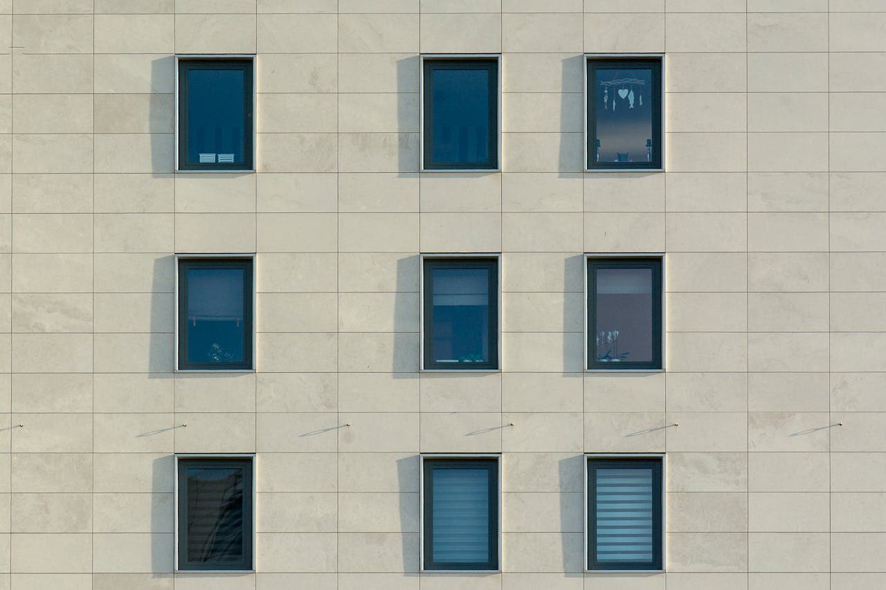Modern building facade showing window frame profiles and glazing systems