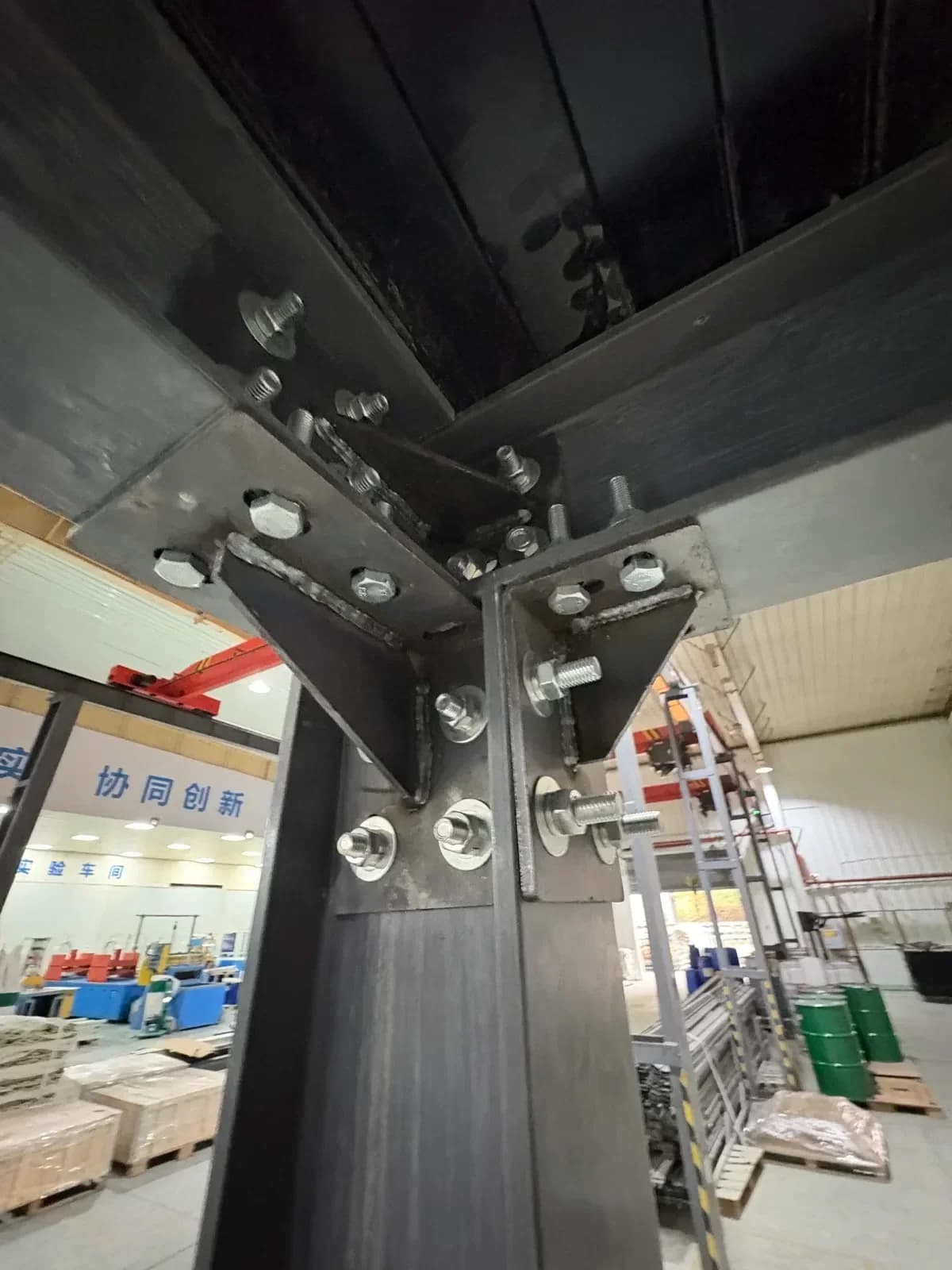 Bolted connection detail between pultruded FRP profiles and 316L stainless steel fasteners — no welding required