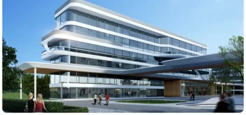 Wanhua Yantai Zero-Carbon Community — close view of a passive-house dormitory building with continuous pultruded GFRP-PU window frames and a high-glazing facade