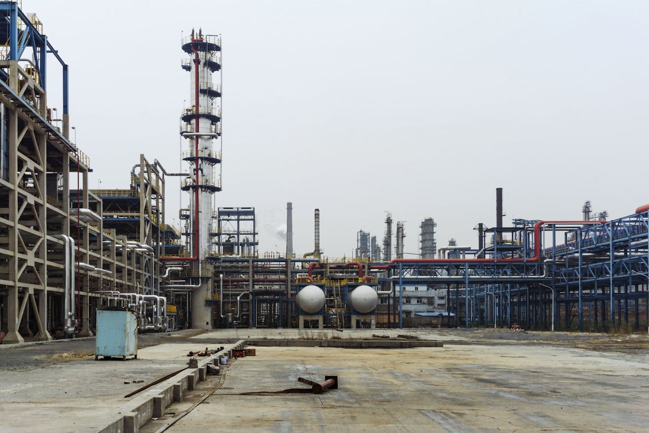 Industrial process facility representing the wet and chemically dosed service environment for FRP cooling tower profiles