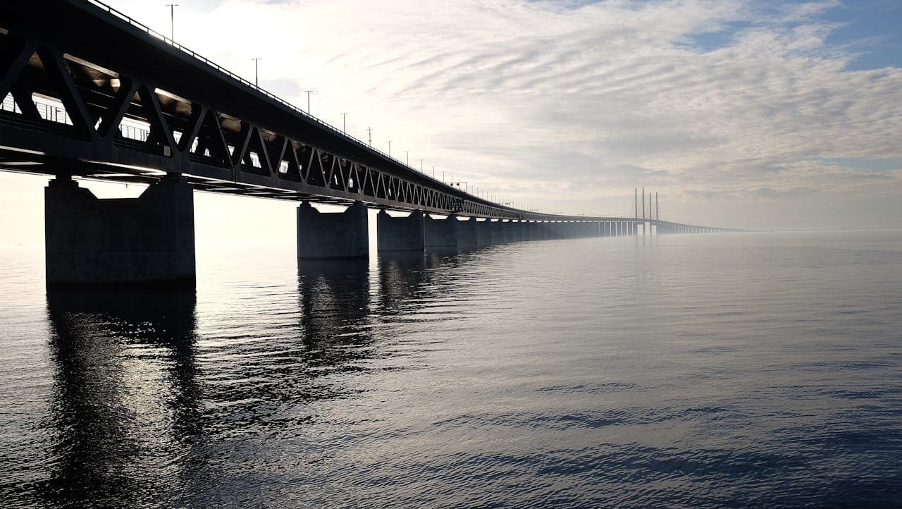 Bridge infrastructure with composite structural profiles for long-span applications
