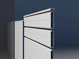 Interlocking fiberglass sound barrier panel cross-section with hollow tongue-and-groove profiles