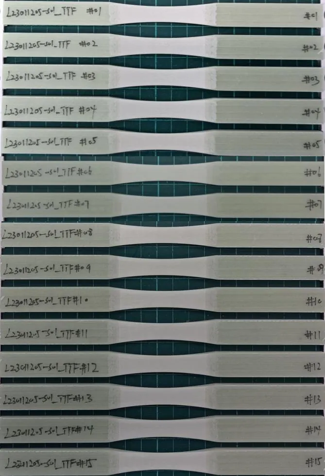 Fifteen machined GFP-WE20 waisted fatigue specimens before tension-tension testing