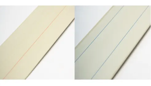 Pultruded fiberglass wind turbine blade panels with longitudinal identification lines